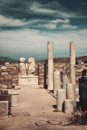 Pillars in historical ruins in Delos Island near Mikonos, Greece.