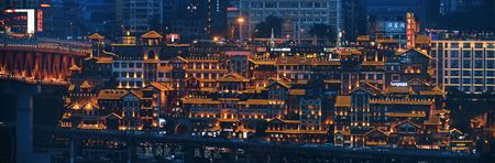 CHONGQING, CHINA â MARCH 13: Hongyadong shopping complex at night on March 13, 2018 in Chongqing. With 17M population, it is the most populous Chinese municipality.のeditorial素材