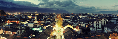 Dali old town rooftop view at dusk. Yunnan, China.の写真素材
