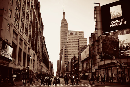 NEW YORK CITY - FEB 19: Street view with skyscrapers on February 19, 2014 in Manhattan, New York City. With population of 8.4M, it is the most populous city in the United States.のeditorial素材