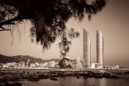 XIAMEN, CHINA â FEB 16: Shimao Twin Tower and trees on February 26, 2018 in Xiamen. Xiamen was ranked as China's 2nd-"most suitable city for living"のeditorial素材