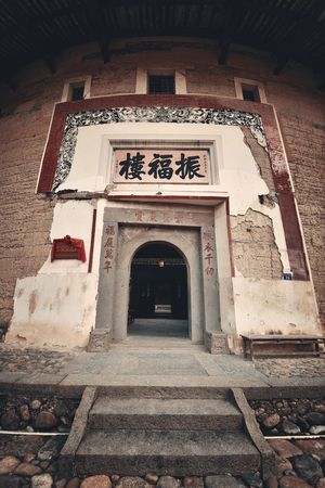 FUJIAN, CHINA â MARCH 2, 2018: Zhenfu Lou is a typical Tulou building. Tulou is the unique traditional rural dwelling of Hakka.のeditorial素材