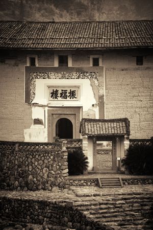 FUJIAN, CHINA â MARCH 2, 2018: Zhenfu Lou is a typical Tulou building. Tulou is the unique traditional rural dwelling of Hakka.のeditorial素材