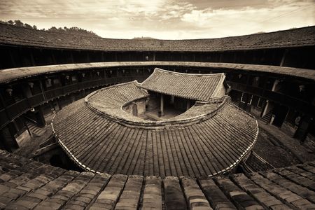 FUJIAN, CHINA â MARCH 2, 2018: Zhenfu Lou is a typical Tulou building. Tulou is the unique traditional rural dwelling of Hakka.のeditorial素材