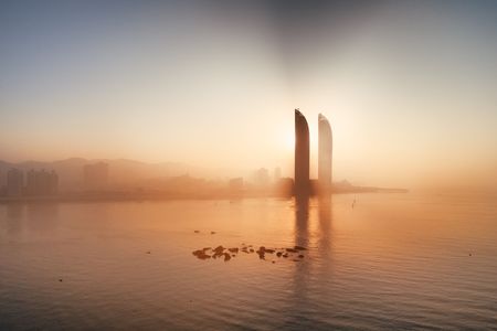 XIAMEN, CHINA â FEB 16: Aerial view of city skyline at sunrise on February 26, 2018 in Xiamen. Xiamen was ranked as China's 2nd-"most suitable city for living"のeditorial素材