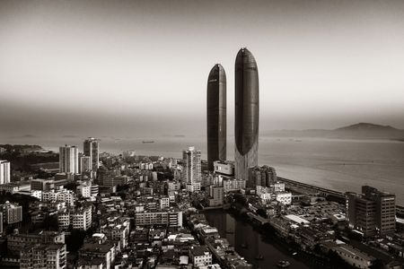 XIAMEN, CHINA â€“ FEB 16: Aerial view of Shimao Twin Tower and city skyline on February 26,...