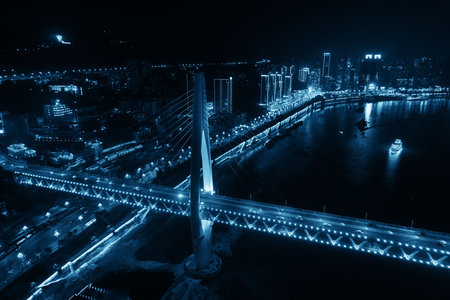 Aerial view of Bridge and city urban architecture at night in Chongqing, China.の写真素材