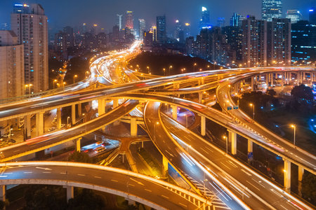 Shanghai Yanan Road overpass bridge at night with heavy traffic in China.の写真素材