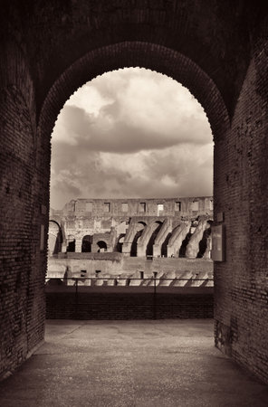 Archway in Colosseum, the world known landmark and the symbol of Rome, Italy.の写真素材