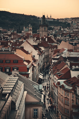 Church of Our Lady before TÃ½n and Prague skyline rooftop view at sunset in in Czech Republicの写真素材