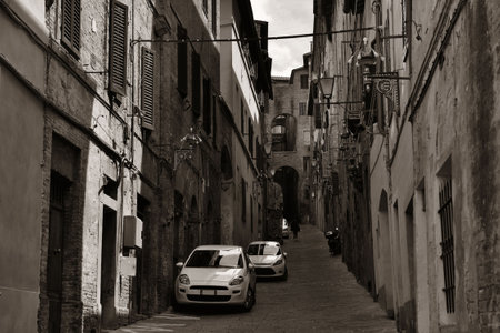 Street view with old buildings in Siena, Italy.の写真素材