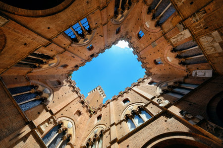 City Hall Bell Tower viewed from patio in Siena Italy.の写真素材