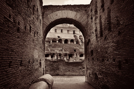 Archway in Colosseum, the world known landmark and the symbol of Rome, Italy.の写真素材