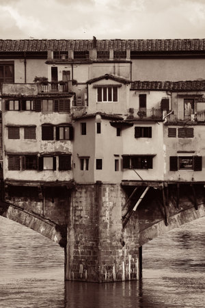 Ponte Vecchio over Arno River in Florence Italy black and white.の写真素材