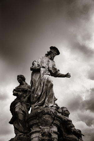 Statue closeup in Charles Bridge in Prague Czech Republicの写真素材