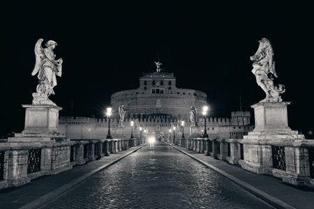Castel Sant Angelo in Italy Rome at night and angel statue on bridgeの写真素材