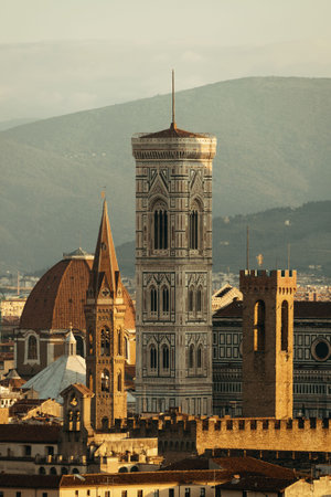 Florence Cathedral and bell tower with city skyline viewed from Piazzale Michelangeloの写真素材