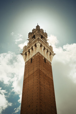 City Hall Bell Tower closeup in Siena Italy.の写真素材