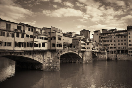 Ponte Vecchio over Arno River in Florence Italy black and white.の写真素材