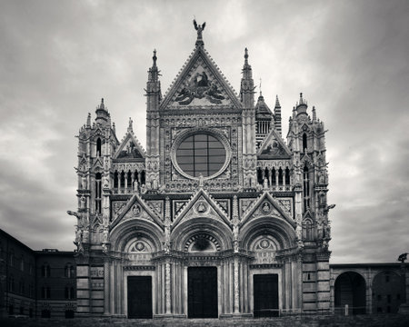 Siena Cathedral closeup as the famous landmark in medieval town in an overcast day in Italy.の写真素材