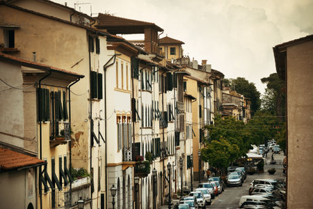 Lucca street view with cars in Italyの写真素材