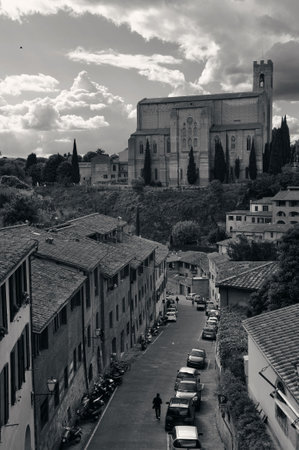 Medieval town Siena skyline view with Basilica of San Domenico in Italyの写真素材