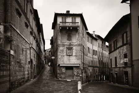 Street view with old buildings in Siena, Italy.の写真素材