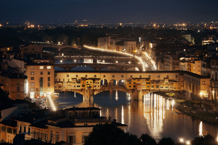 Florence skyline viewed from Piazzale Michelangelo at night with Ponte Vecchioの写真素材
