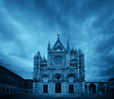 Siena Cathedral closeup as the famous landmark in medieval town in an overcast day in Italy.の写真素材