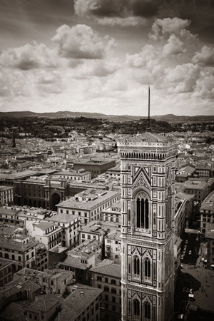 Duomo Santa Maria Del Fiore bell tower and city skyline in Florence Italy black and white.の写真素材