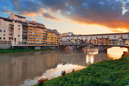 Ponte Vecchio over Arno River in Florence Italy at sunriseの写真素材