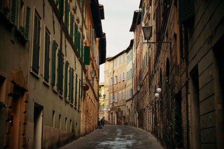 Street view with old buildings in Siena, Italy.の写真素材