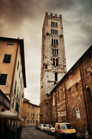 Lucca street view with bell tower in Italyの写真素材