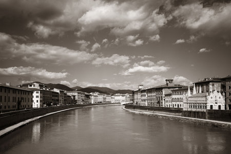 Pisa city over river with architecture in Italyの写真素材