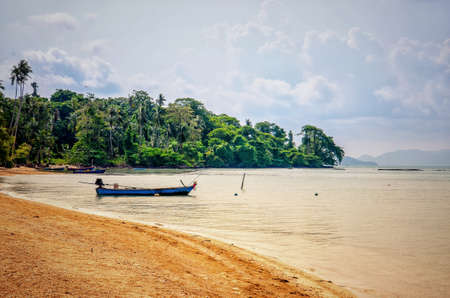 fishing boat near sand beach at koh mak ,trat , thailandの写真素材