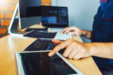 Developing programmer development website design and coding technologies working in software company...
