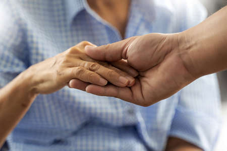People old woman and young hand care holding healthcare disabled walking with assistance