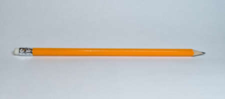 Yellow sharpened pencil with eraserの写真素材