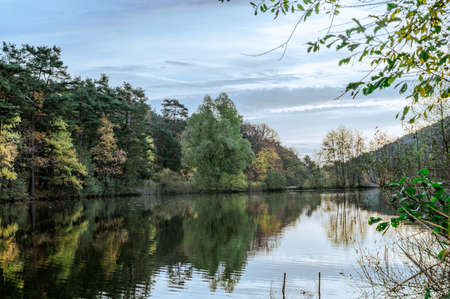 Autumn morning at the sand meadow pond in St. Martinの写真素材