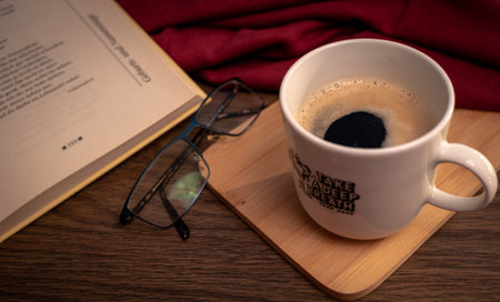 Coffee break with a good bookの写真素材