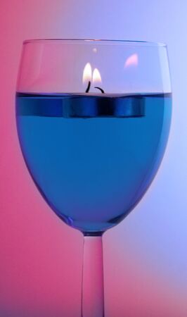 Floating candles in wine glass