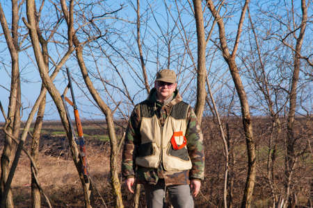 Hunter taking a break from hunting and used the opportunity to poseの写真素材