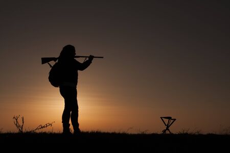 Female Upland Game Hunter in Sunset