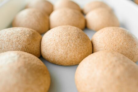 Wheat dough with flour. Cooking pizza with italian Yellow dough. Food blanks in restaurant. Flour productsの写真素材