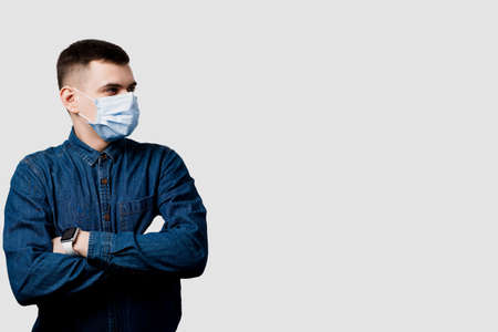 Crypto currency investor in medical mask earn money on the growth of the exchange rate of bitcoin.