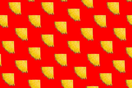Pineapple pattern mix of tropical citrus fruits on red background.の写真素材
