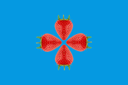 Strawberry pattern on blue background. Seasonal berry.の写真素材