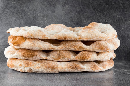 Dough for pinsa romana and scrocchiarella from 4 types of flour. Italian gourmet cuisine. Traditional dish in italyの写真素材