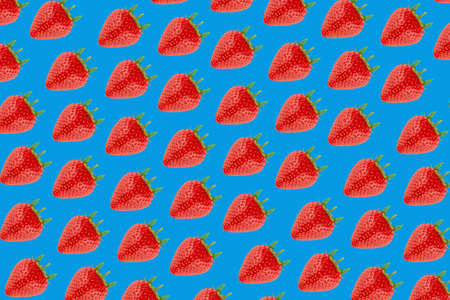 Strawberry pattern on blue background. Seasonal berry.