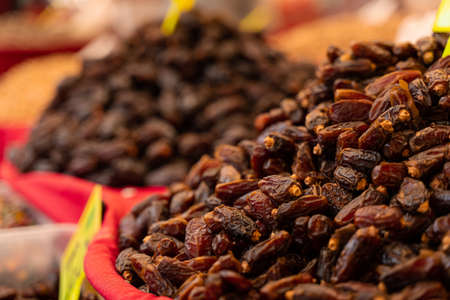 Dates on counter on Turkish market. Dried sweet datesの写真素材